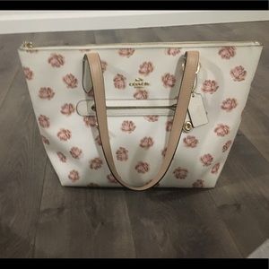 Coach rose print Taylor tote, with pebble leather.